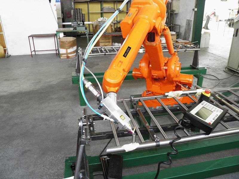 Automated 3D robotic fiber laser welding system with 6-axis manipulator